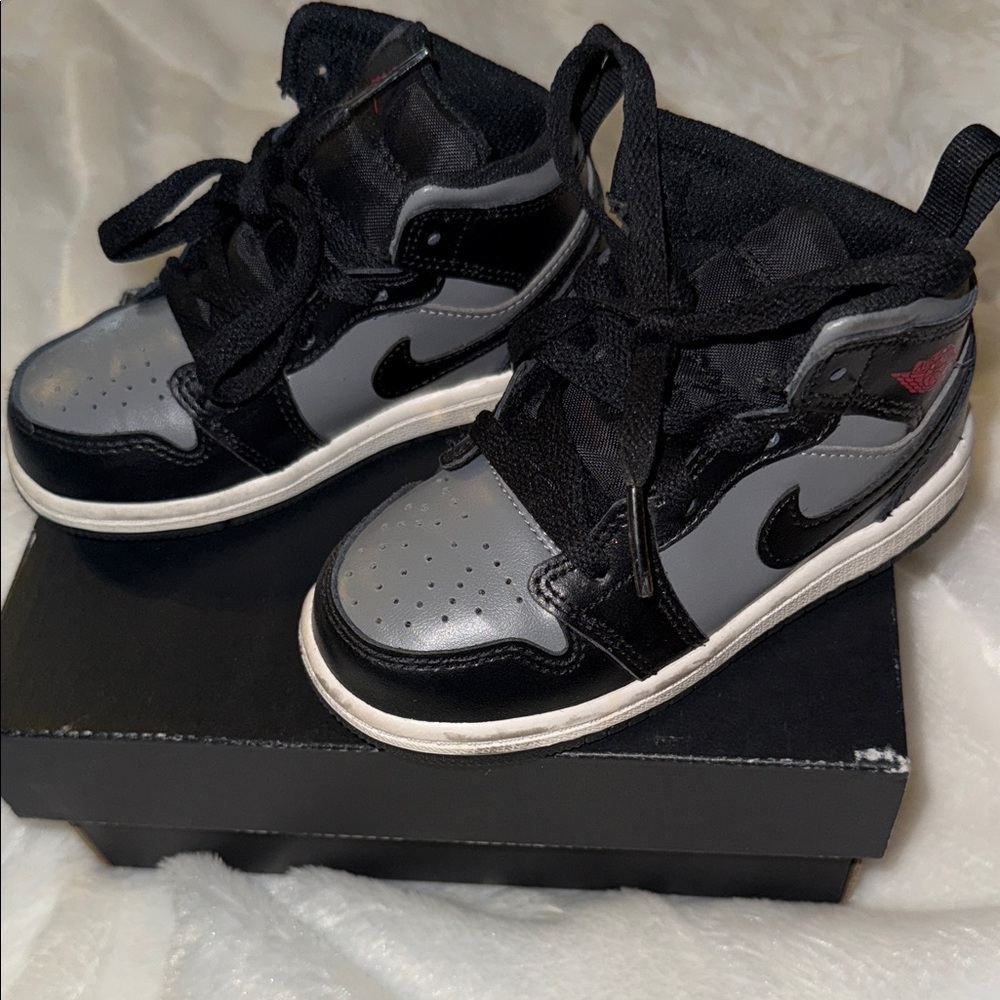 Jordan Kids Black and Gray Sneakers with Red Accent